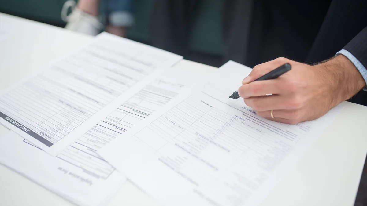 Registering residenza at an Italian comune's Anagrafe counter.